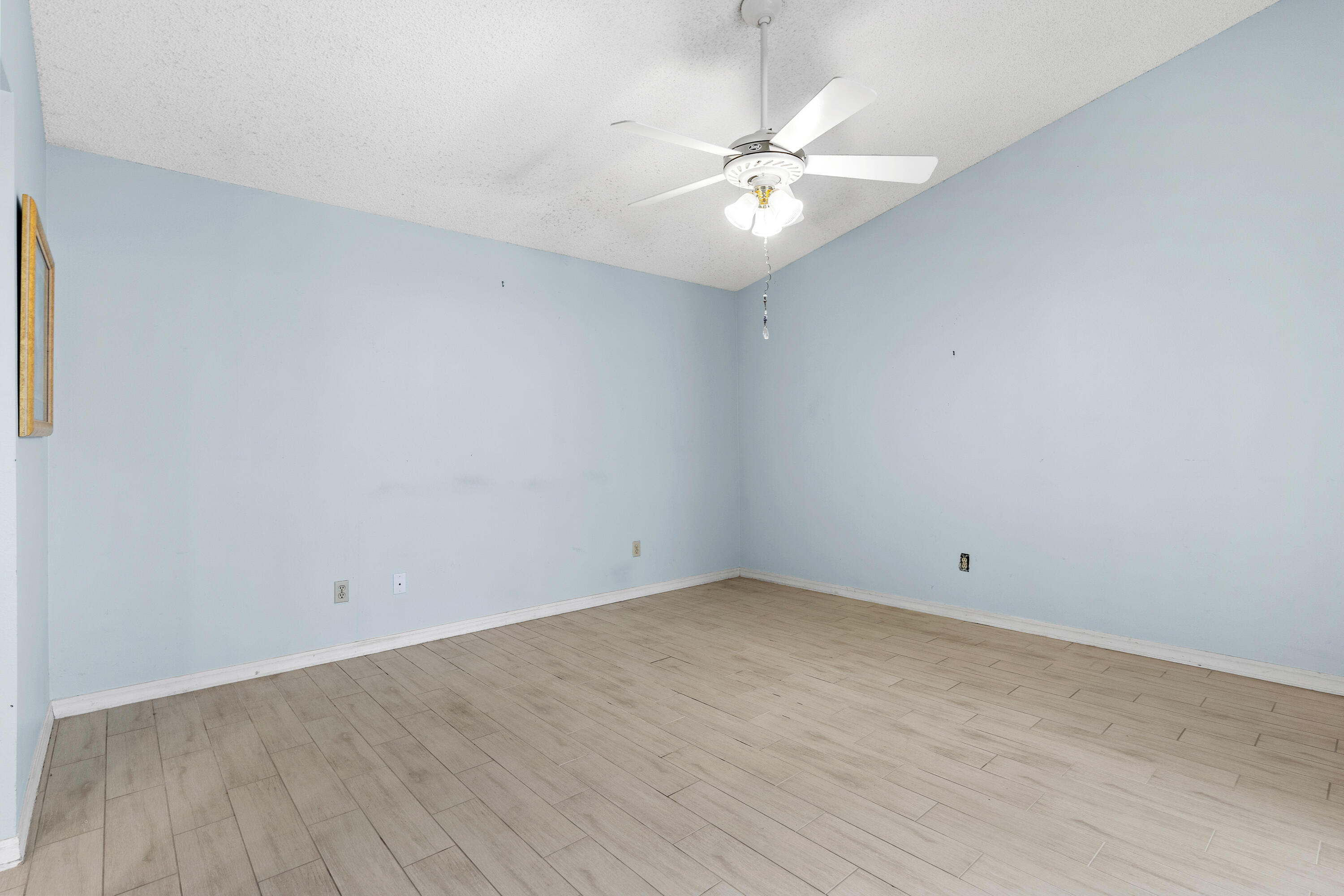 351 L'Atrium Drive Miramar Beach, FL 32550 - Photo 18 of 48 a view of an empty room with wooden floor