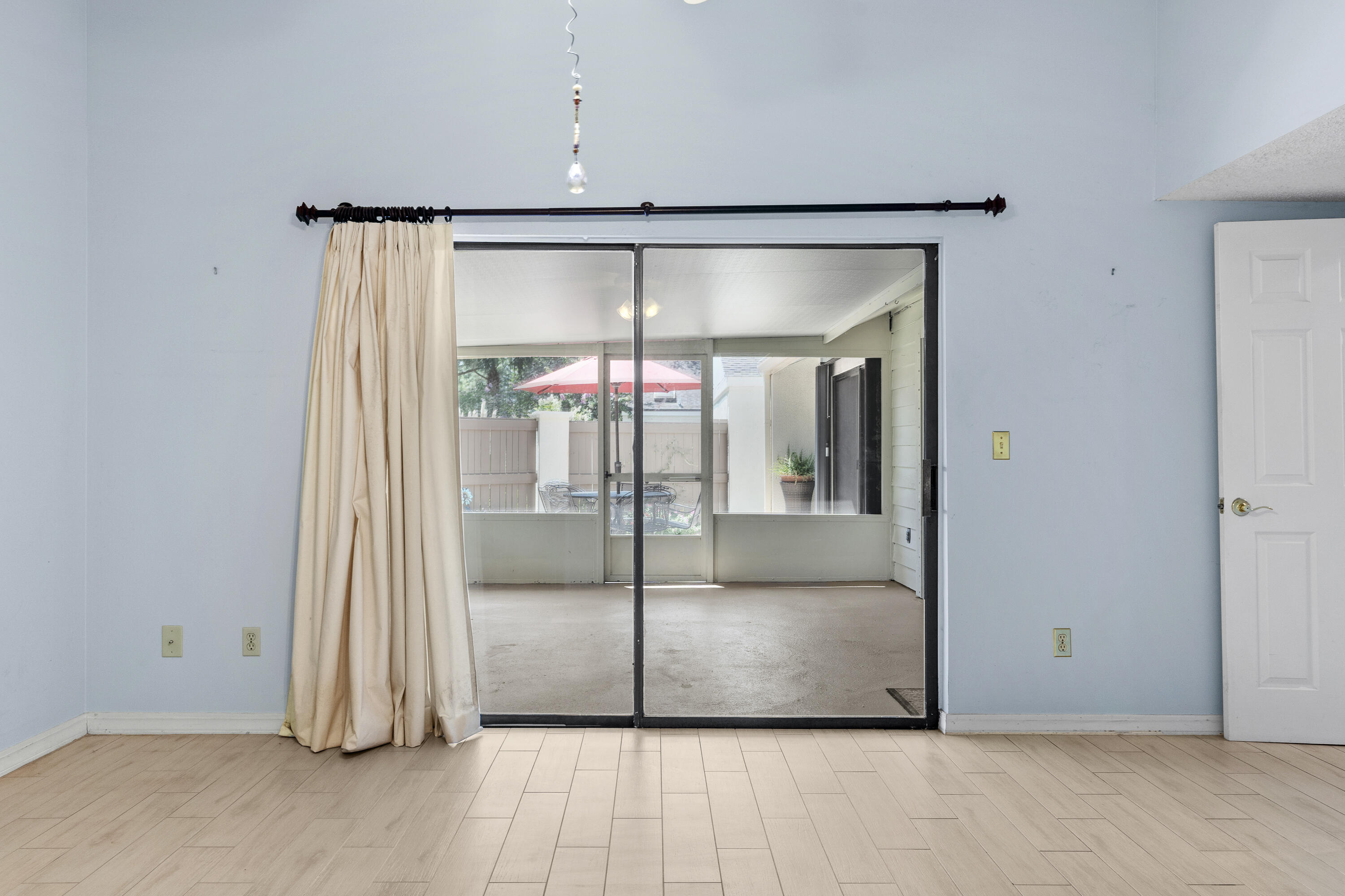 351 L'Atrium Drive Miramar Beach, FL 32550 - Photo 19 of 48 an empty room that has a glass door and mirror