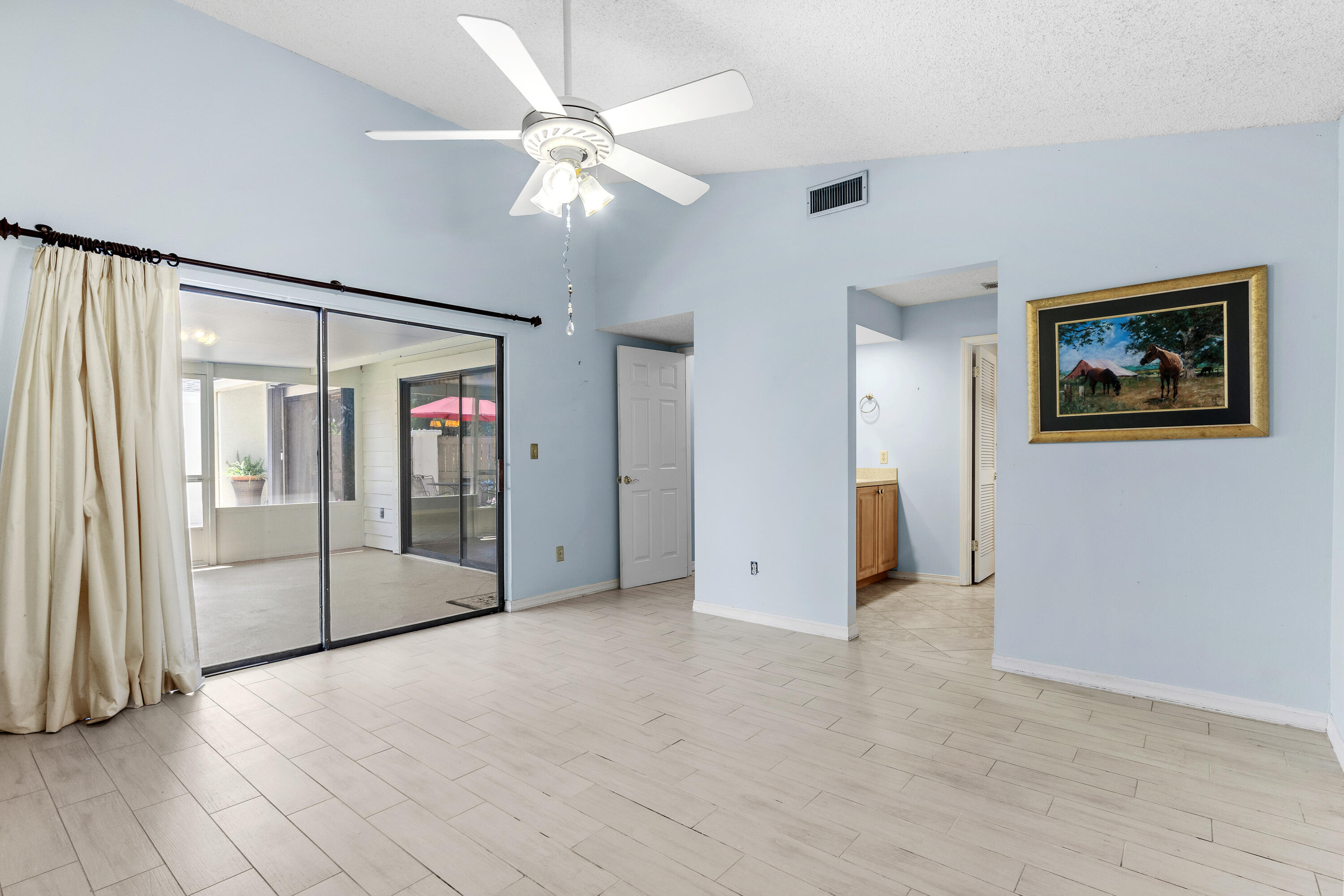 351 L'Atrium Drive Miramar Beach, FL 32550 - Photo 20 of 48 an empty room with fan and windows