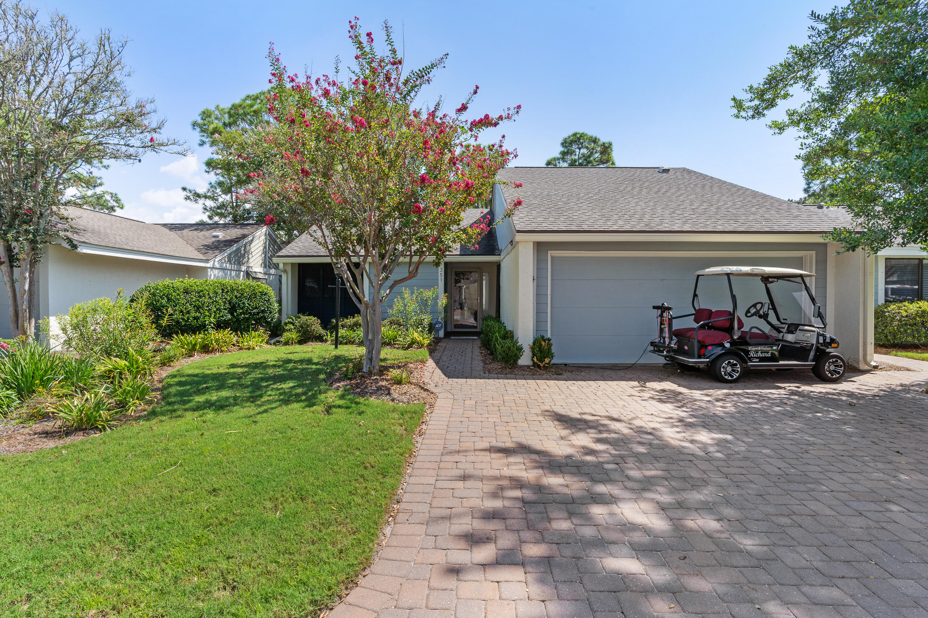351 L'Atrium Drive Miramar Beach, FL 32550 - Photo 2 of 48 a view of a house with backyard