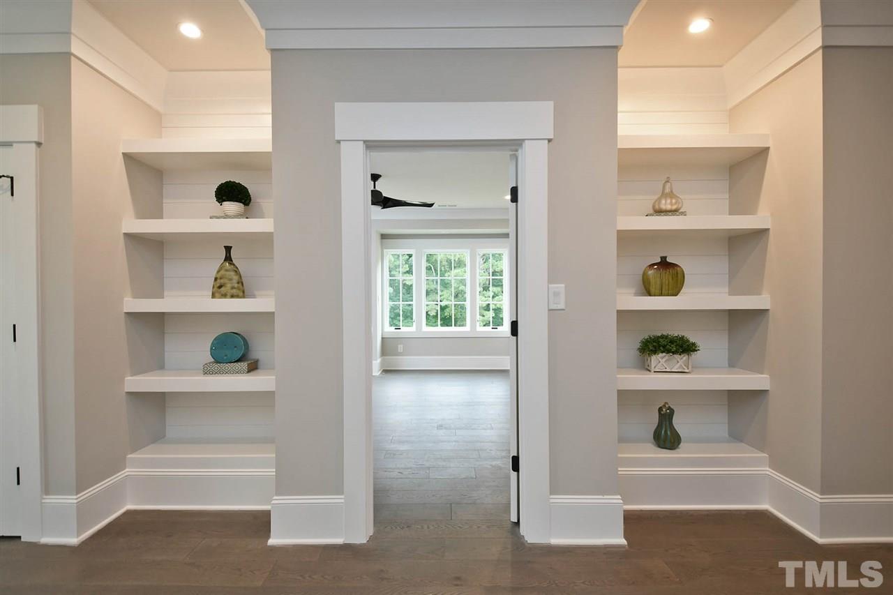 1417 Sky Vista Way Raleigh, NC 27613 - Photo 22 of 26 a view of an entryway with wooden floor