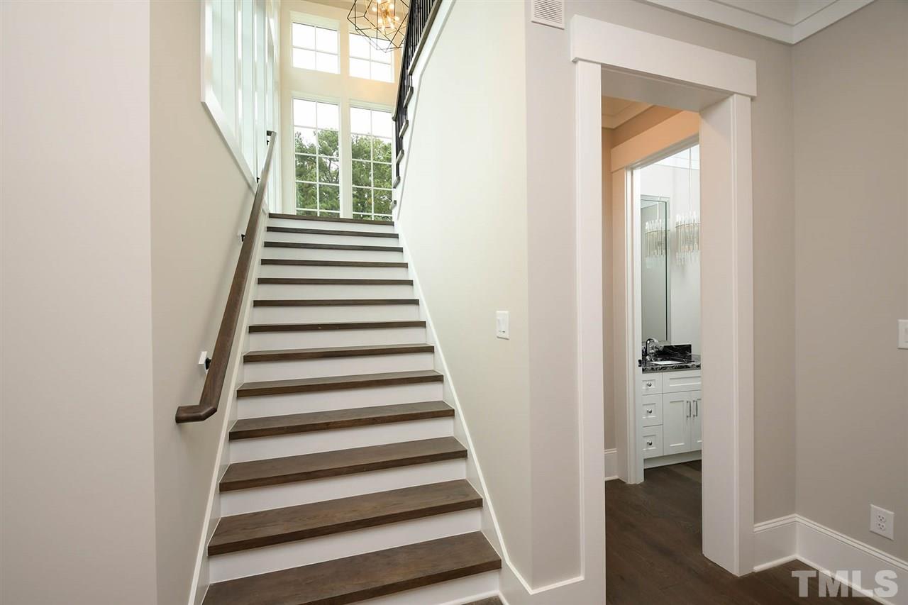 1417 Sky Vista Way Raleigh, NC 27613 - Photo 23 of 26 a view of entryway and hall with wooden floor