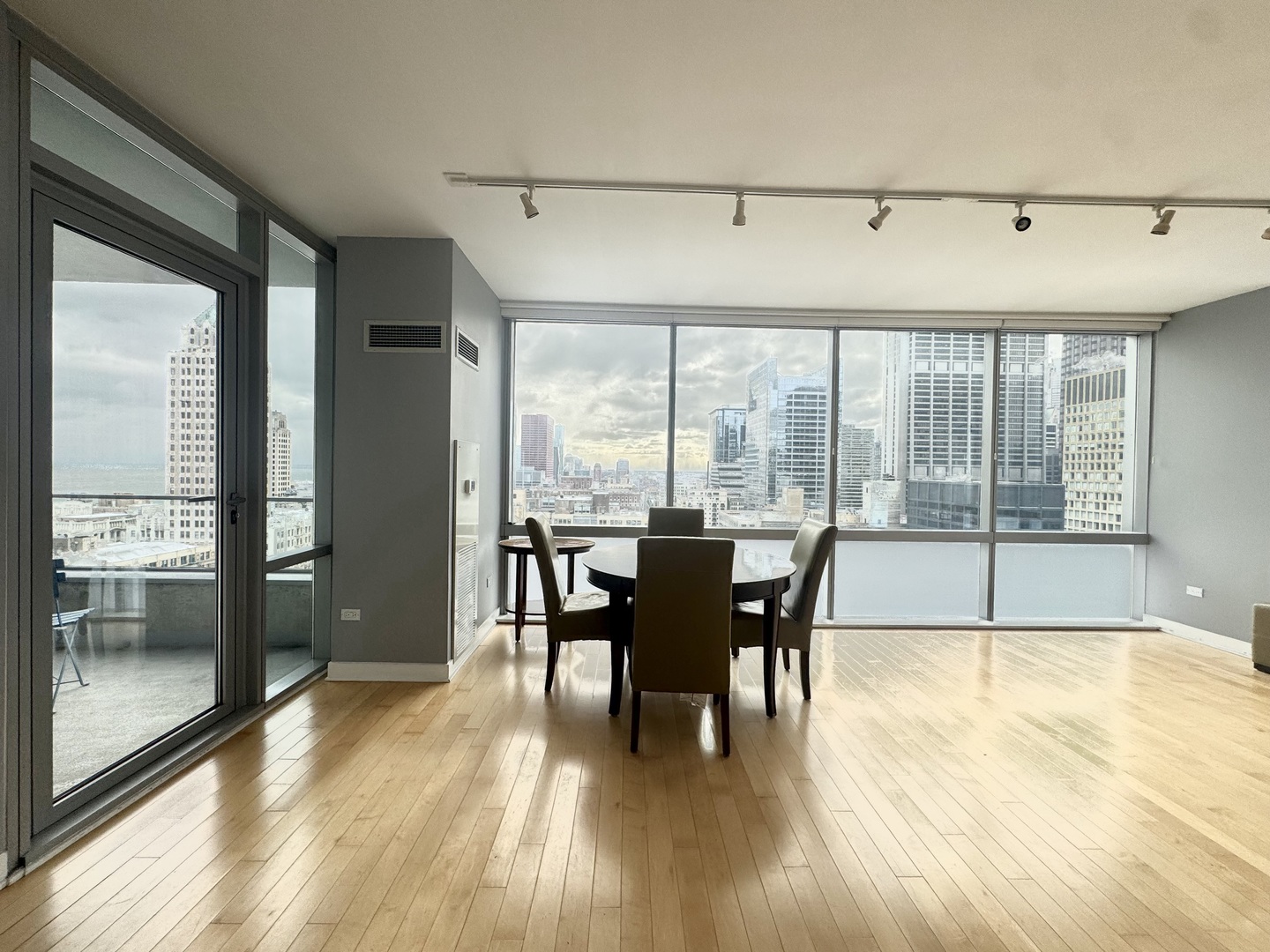 Undisclosed Address Chicago, IL 60601 - Photo 4 of 18 a dining room with furniture window and wooden floor