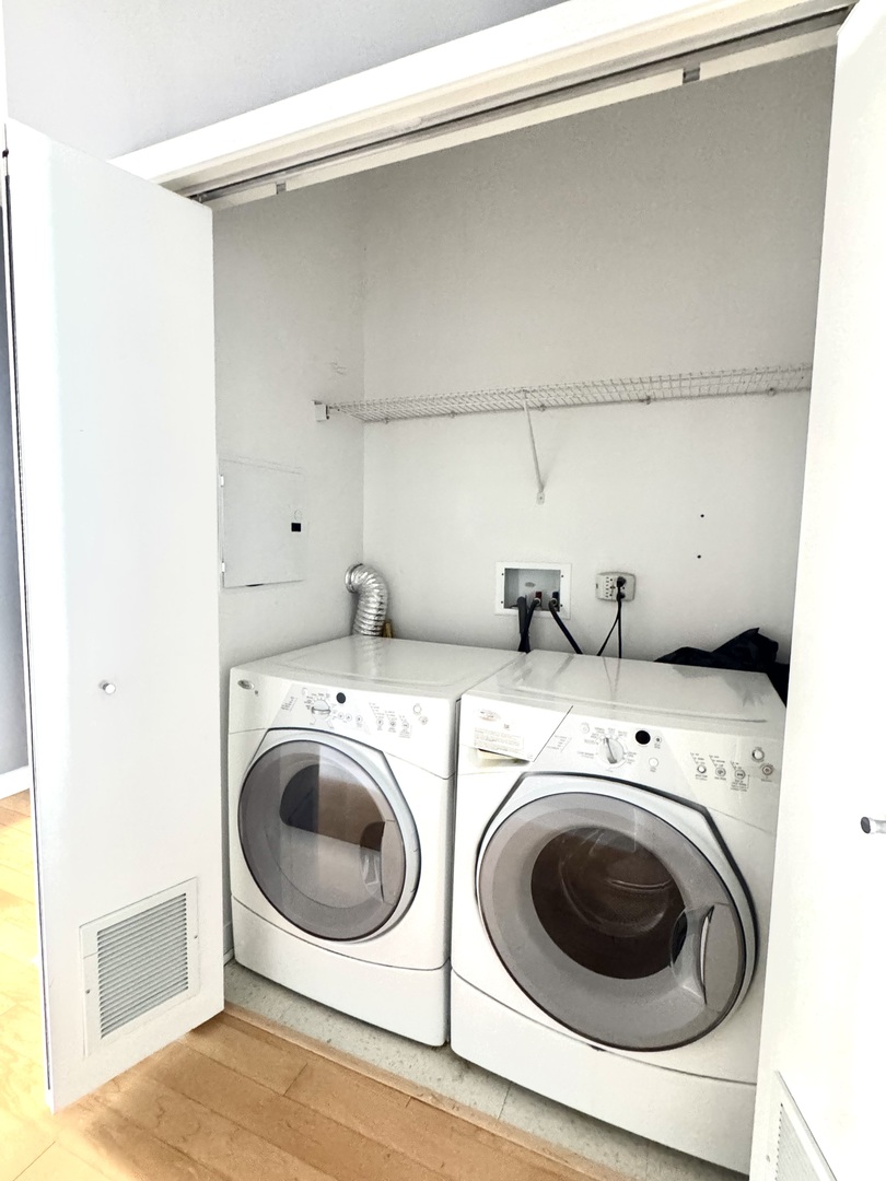 Undisclosed Address Chicago, IL 60601 - Photo 10 of 18 a utility room with dryer and washer
