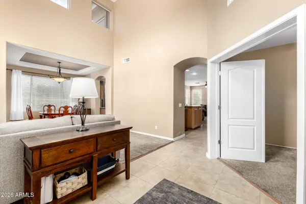 a room with a table and chairs