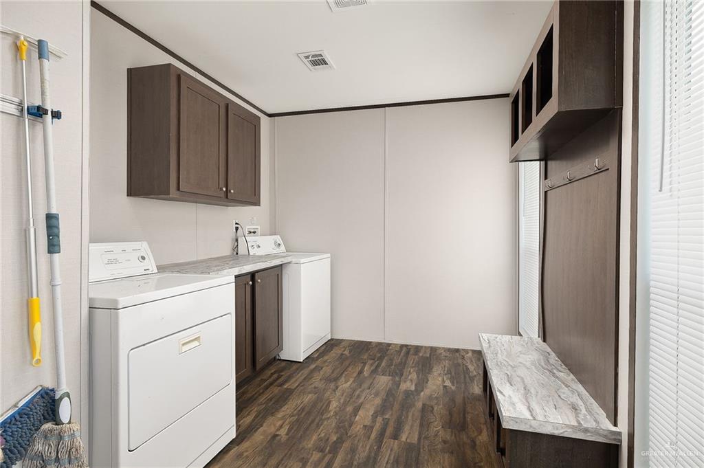 35237 General Brant Road Rio Hondo, TX 78583 - Photo 9 of 27 a utility room with cabinets washer and dryer