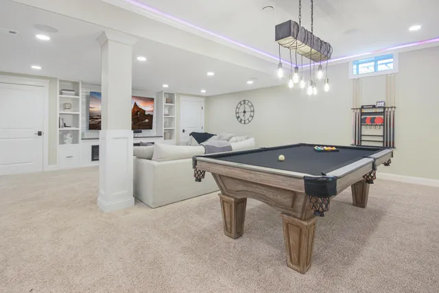 a room with furniture and a chandelier