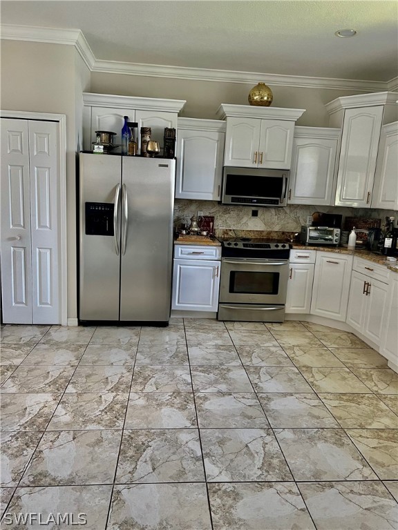 6091 Park Road Fort Myers, FL 33908 - Photo 8 of 22 a kitchen with stainless steel appliances granite countertop a stove a sink and a refrigerator