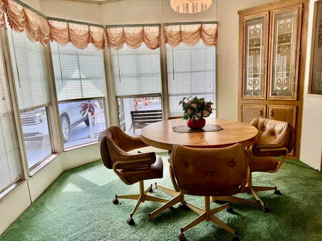 a living room with furniture and a gate