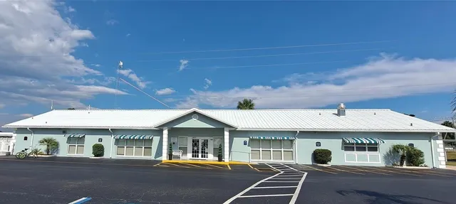 a front view of a building with street view