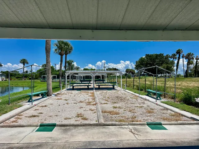 a view of a swimming pool with a patio