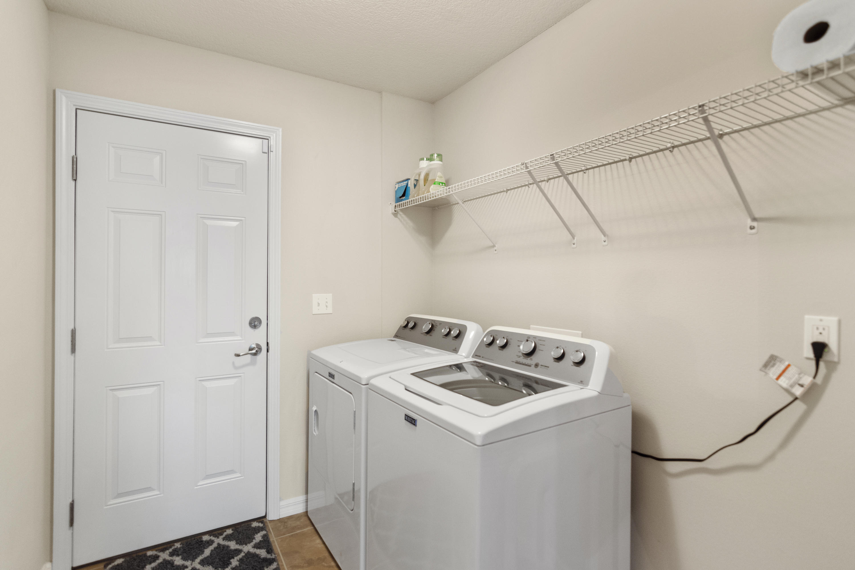 6336 Possum Ridge Road Crestview, FL 32539 - Photo 30 of 40 a utility room with dryer and washer
