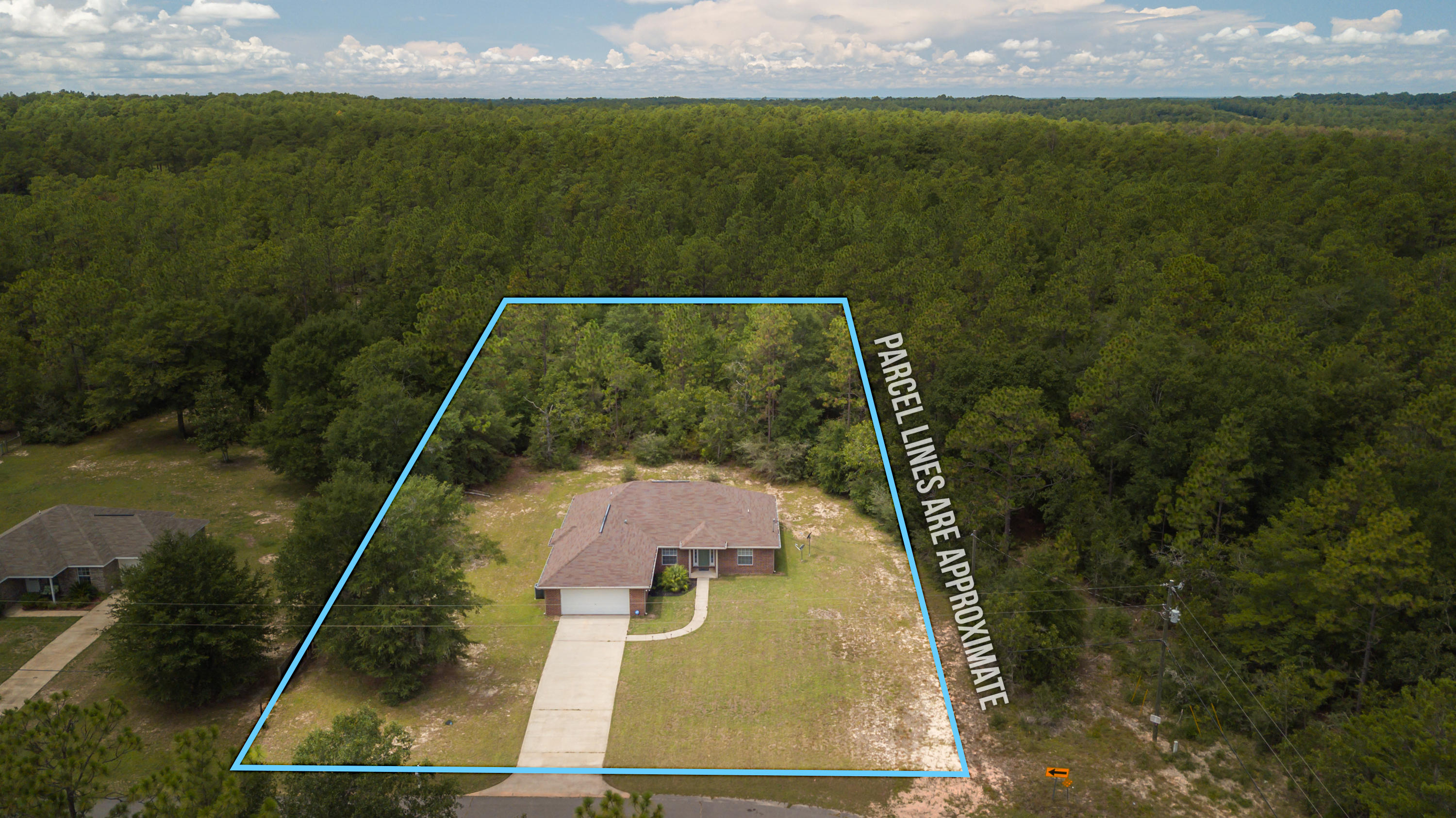 6336 Possum Ridge Road Crestview, FL 32539 - Photo 7 of 40 a view of a back yard