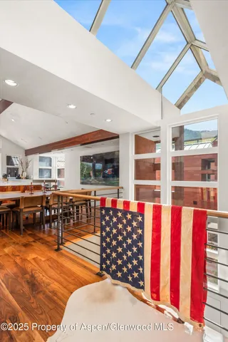 a view of a living room and kitchen view