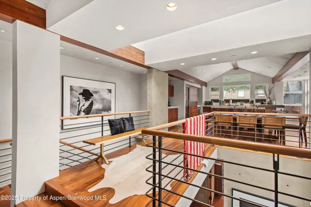 a kitchen with stainless steel appliances granite countertop a sink and a stove
