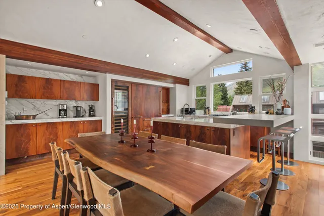 a bathroom with a double vanity sink mirror and shower