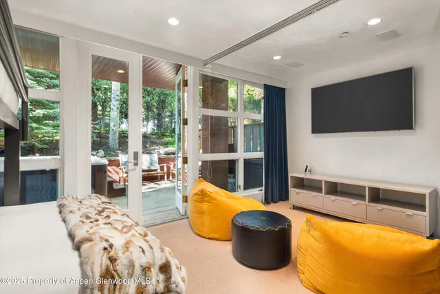 a view of a car parked in front of a house