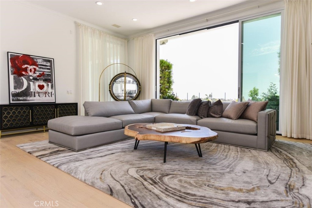 7 Via Brezza Newport Coast, CA 92657 - Photo 26 of 75 a living room with furniture and a large window