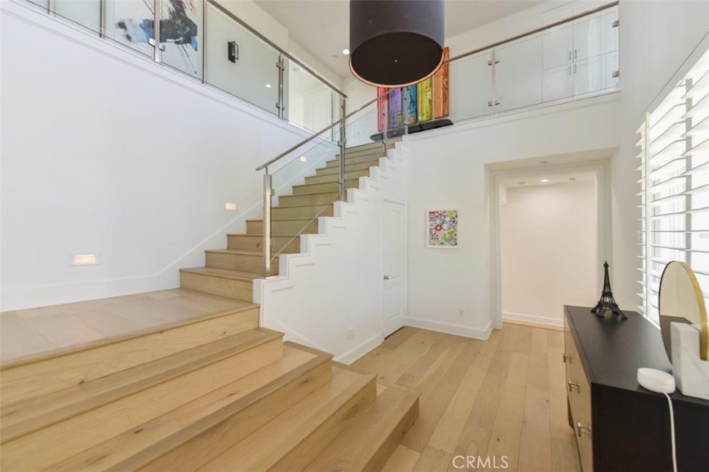 7 Via Brezza Newport Coast, CA 92657 - Photo 39 of 75 a view of entryway and hall with wooden floor