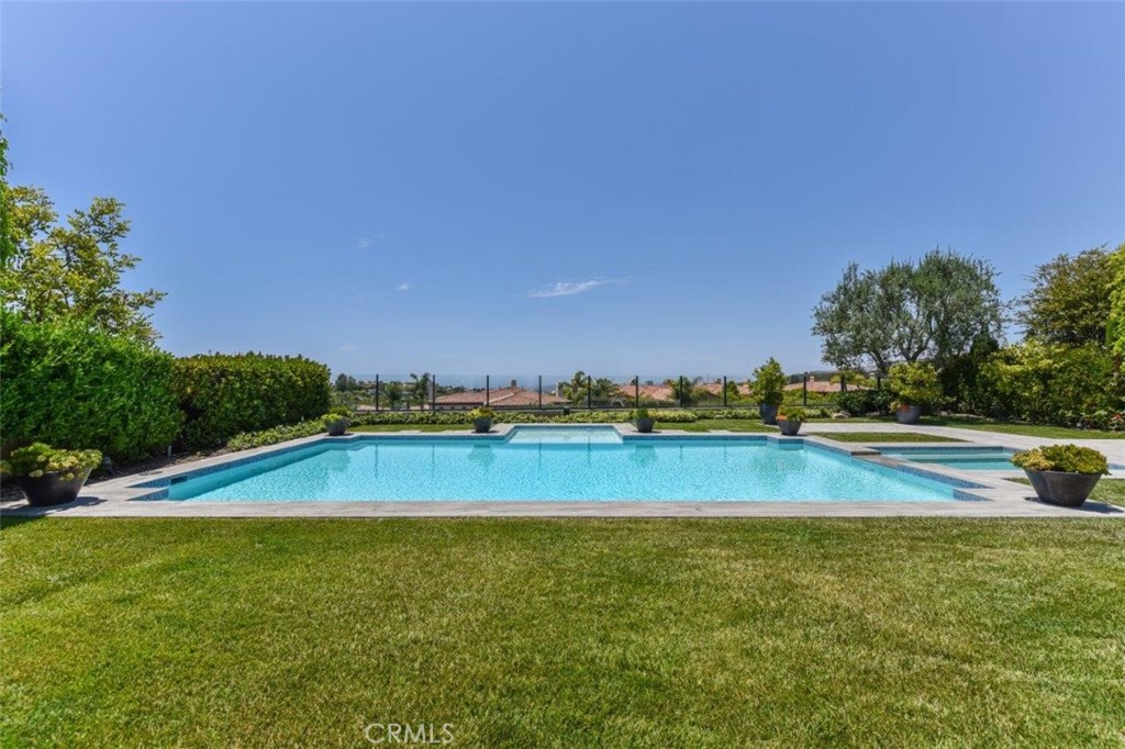 7 Via Brezza Newport Coast, CA 92657 - Photo 57 of 75 a view of an outdoor space and swimming pool