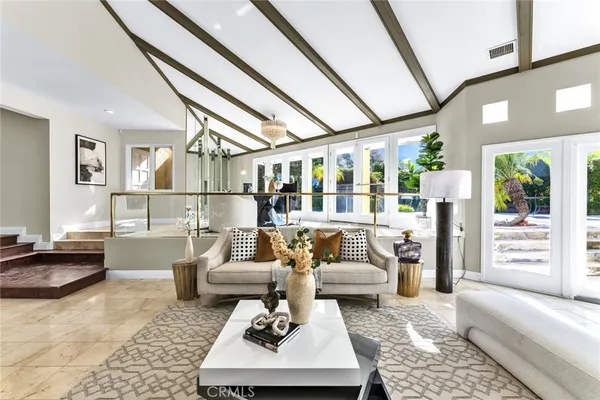 a living room with furniture and a couch