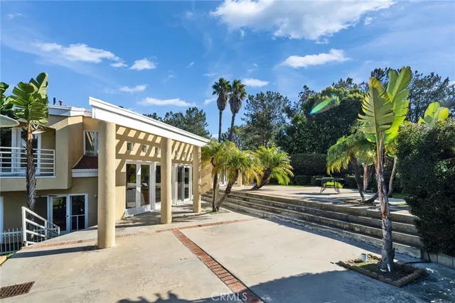 a view of a street with a building in the background