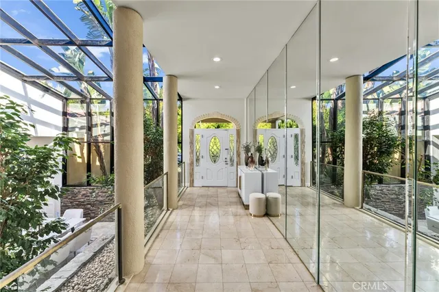 a lobby with furniture and shower