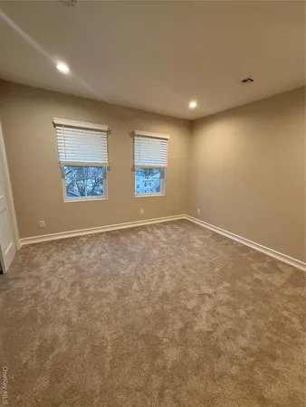 an empty room with windows