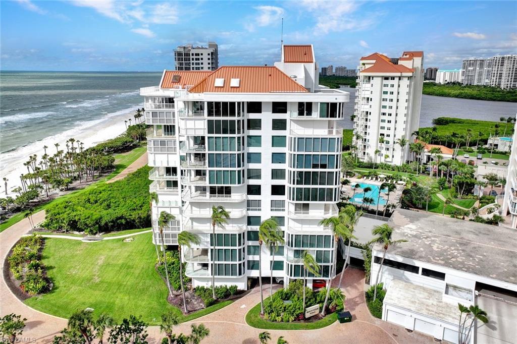 20 Seagate Drive, Unit 1102 Naples, FL 34103 - Photo 11 of 40 a view of a city and tall buildings