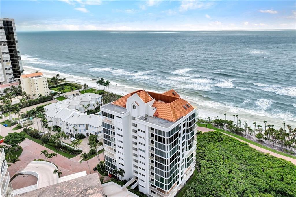20 Seagate Drive, Unit 1102 Naples, FL 34103 - Photo 33 of 40 swimming pool view with a seating space