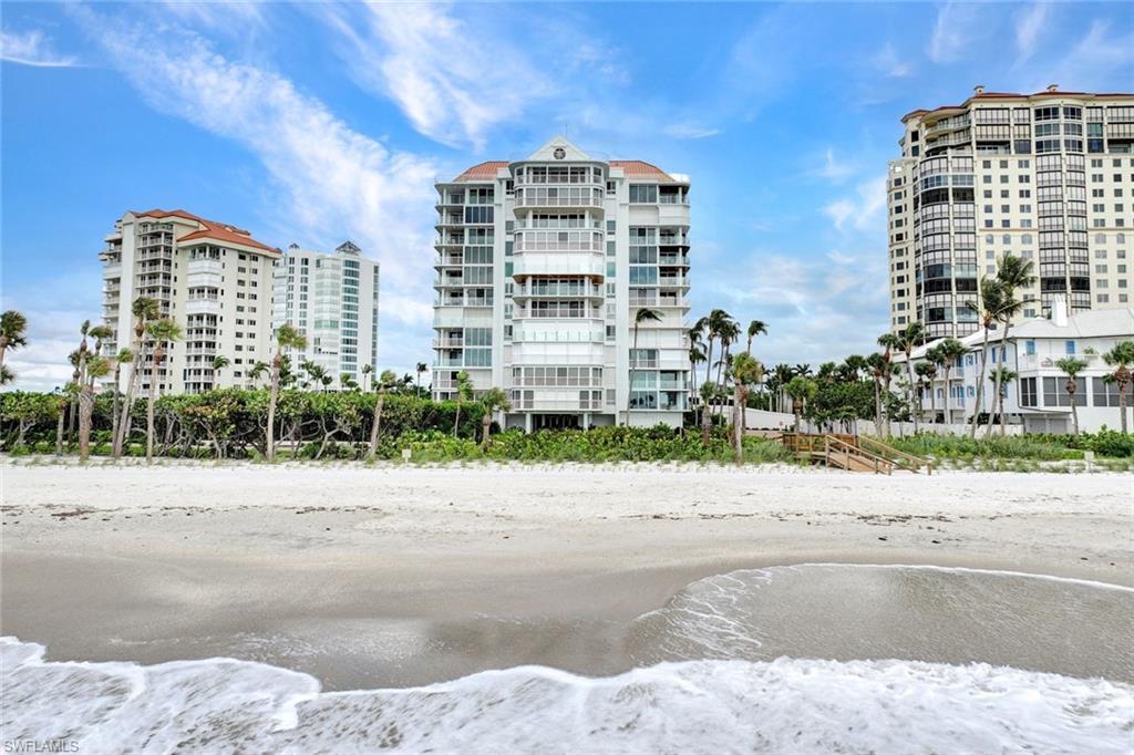 20 Seagate Drive, Unit 1102 Naples, FL 34103 - Photo 35 of 40 a front view of a building