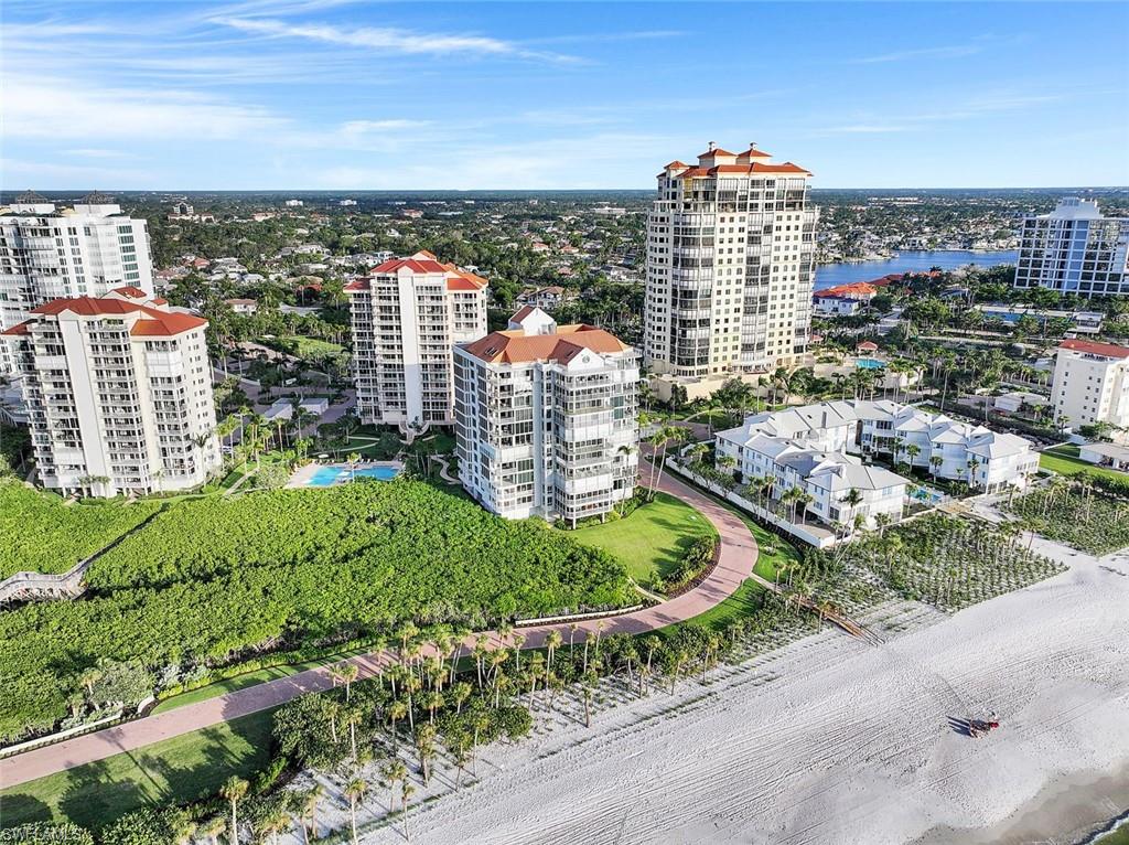 20 Seagate Drive, Unit 1102 Naples, FL 34103 - Photo 39 of 40 a view of a city with tall buildings