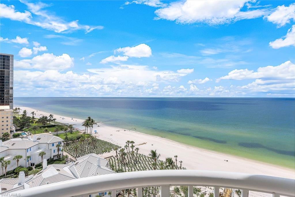 20 Seagate Drive, Unit 1102 Naples, FL 34103 - Photo 10 of 40 a view of a lake from a balcony