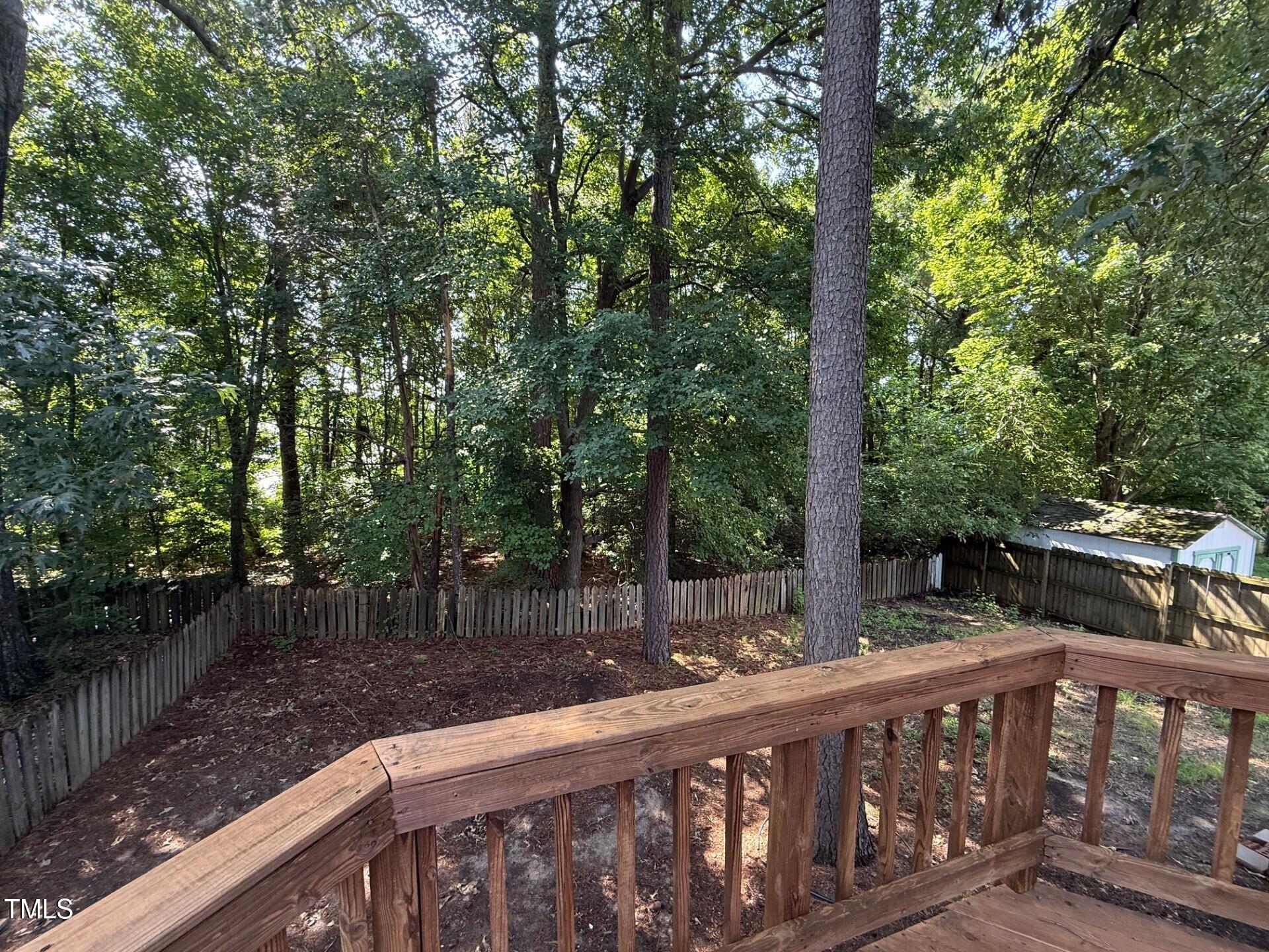 8316 Bellingham Circle Raleigh, NC 27615 - Photo 6 of 22 a view of street with a yard