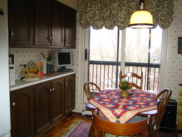1140 Old Mill Road, Unit 504F Hinsdale, IL 60521 - Photo 14 of 21 a dining room with furniture and window