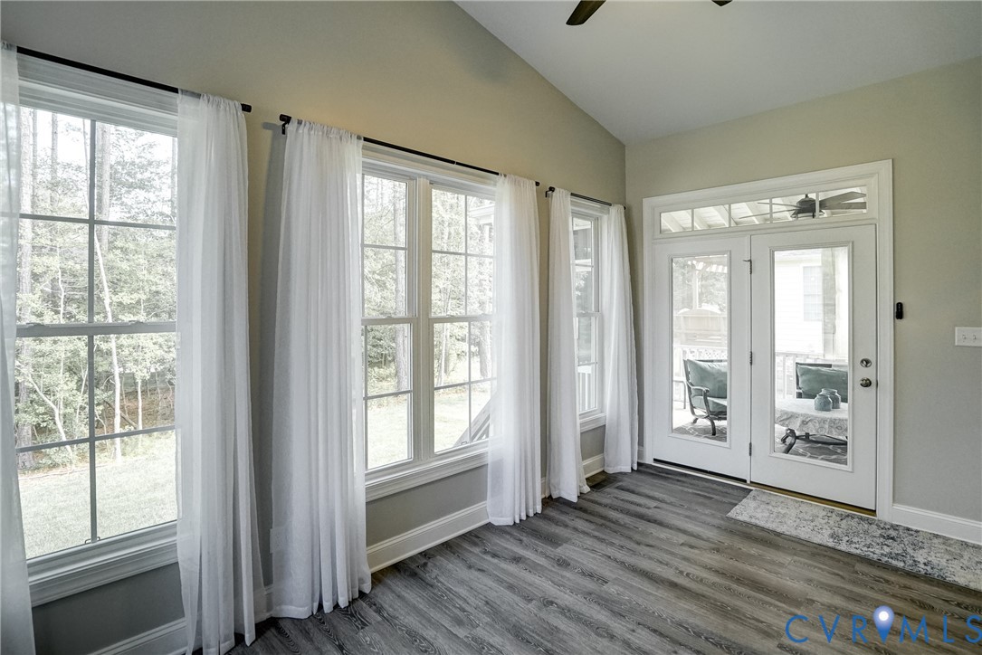 4669 Woburn Road Providence Forge, VA 23140 - Photo 35 of 78 a view of an empty room with wooden floor and a window