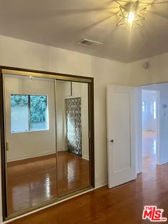 a bathroom with a sink a toilet and bathtub