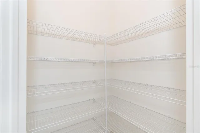 a view of an empty walk in closet