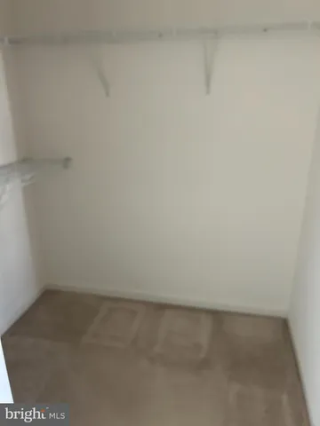 a view of an empty room with window