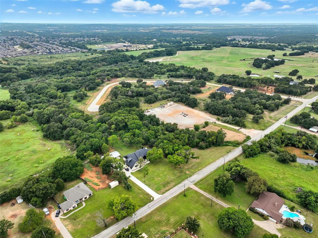 1617 Private Access 60200 Burleson, TX 76028 - Photo 8 of 19 an aerial view of a house with a yard