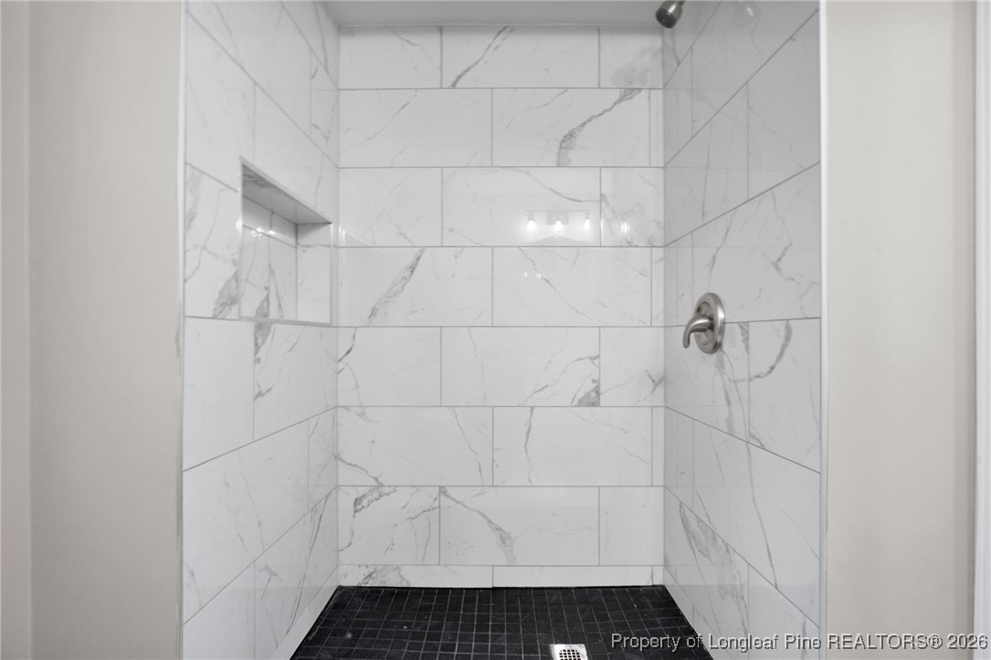 382 Saddle Ridge Road Fayetteville, NC 28311 - Photo 19 of 22 a bathroom with a shower