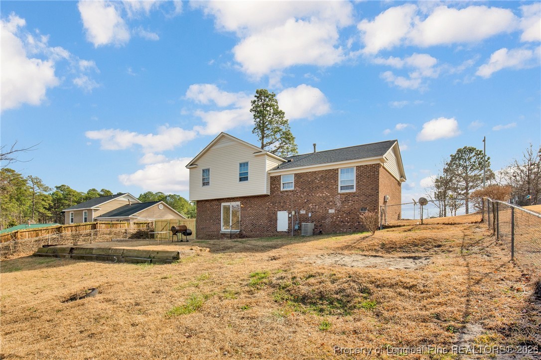 382 Saddle Ridge Road Fayetteville, NC 28311 - Photo 21 of 22 a view of a house with snow on the road