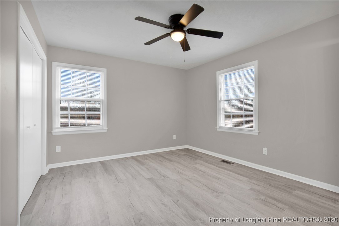 382 Saddle Ridge Road Fayetteville, NC 28311 - Photo 6 of 22 a view of room with a ceiling fan and window
