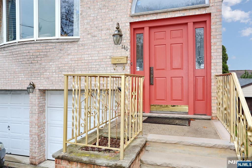 140 Prospect Street Hasbrouck Heights, NJ 07604 - Photo 2 of 28 a view of front door of a house with stairs