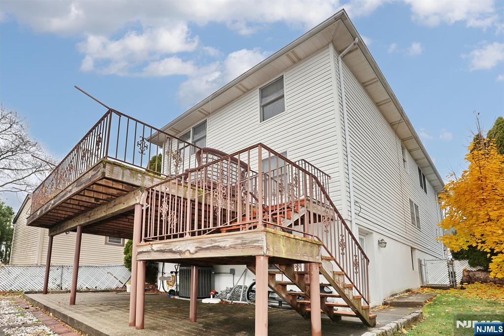 140 Prospect Street Hasbrouck Heights, NJ 07604 - Photo 24 of 28 a view of a building with a deck