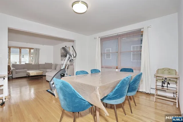 a view of a livingroom with furniture and a table