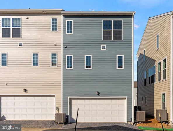a view of a house with a garage