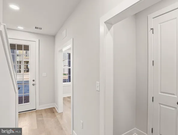 a view of livingroom with hardwood floor and entrance