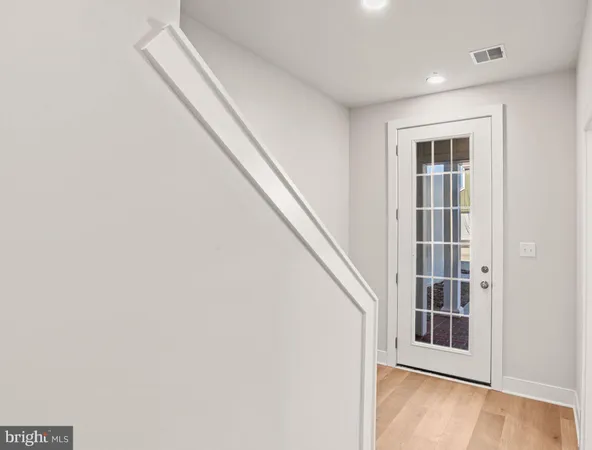 a view of staircase with white walls and white walls