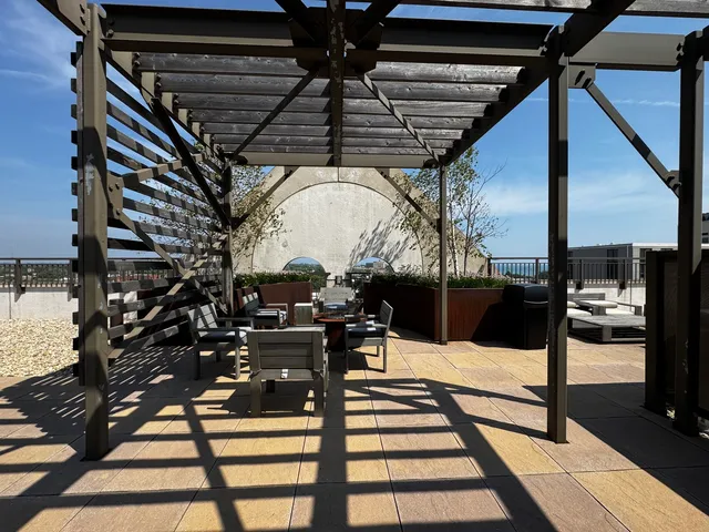 a terrace of a house with outdoor seating